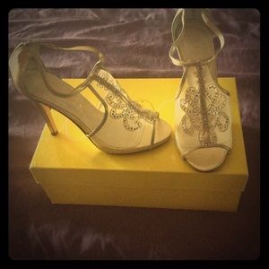 Gold colored shoes with fine mesh worn once